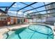 Relaxing pool area with patio furniture and screened enclosure at 1107 Seafarer Ln, Winter Springs, FL 32708