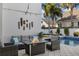 Backyard includes a seating area with a fire pit and view of the home's exterior at 11413 Camden Park Dr, Windermere, FL 34786
