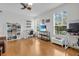 Bright, spacious bedroom features hardwood floors, two windows and versatile workspace at 11413 Camden Park Dr, Windermere, FL 34786