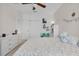 Bright bedroom featuring natural light, a ceiling fan and a double closet at 11413 Camden Park Dr, Windermere, FL 34786