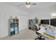 Office with natural light, a ceiling fan, double closet, and shelving with storage at 11413 Camden Park Dr, Windermere, FL 34786