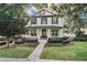 House exterior showcasing landscaping and brick pathway at 11413 Camden Park Dr, Windermere, FL 34786