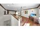 Cozy upstairs living area with hardwood floors and entertainment center at 11413 Camden Park Dr, Windermere, FL 34786