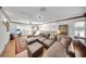 Comfortable bonus room with plush seating, large windows, and a cozy atmosphere at 11413 Camden Park Dr, Windermere, FL 34786