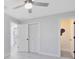 Bedroom with double closet, and doorways leading to the kitchen and the bathroom at 1312 Surf Ave, Apopka, FL 32703