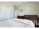 Bedroom with a crib and neutral decor at 14694 Seton Creek Blvd, Winter Garden, FL 34787