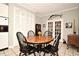 Cozy dining area adjacent to kitchen, featuring ample natural light from French doors at 1821 Stanley St, Longwood, FL 32750