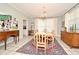 Bright dining room with a large table and chandelier at 1821 Stanley St, Longwood, FL 32750