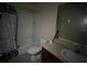 Bathroom with shower/tub combo, toilet and vanity at 1976 Estancia Cir # 1976, Kissimmee, FL 34741