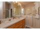 Bathroom with walk-in shower and double vanity at 2104 Cranberry Isles Way, Apopka, FL 32712