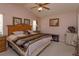 Large main bedroom with king-size bed and ceiling fan at 2104 Cranberry Isles Way, Apopka, FL 32712