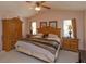 Large main bedroom with king-size bed and ceiling fan at 2104 Cranberry Isles Way, Apopka, FL 32712