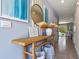 Entryway with console table, mirror, and pampas grass decor at 2175 Longleaf Rd, Davenport, FL 33837