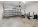 Spacious garage with ample storage and room for a home gym at 2583 Sedge Grass Way, Orlando, FL 32824