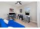 Home office with two workspaces and a comfortable daybed at 2583 Sedge Grass Way, Orlando, FL 32824