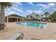 Inviting community pool with plenty of lounge chairs at 2583 Sedge Grass Way, Orlando, FL 32824