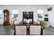 Formal dining room with a dark wood table and chairs at 2709 Greenlands St, St Cloud, FL 34772