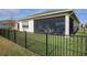 Screened patio with a view of the backyard at 2709 Greenlands St, St Cloud, FL 34772