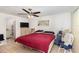 Bedroom with neutral tile flooring and a ceiling fan at 2825 Greenfield Ave, Orlando, FL 32808