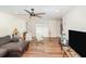 Living room featuring wood-look floors and neutral paint at 2825 Greenfield Ave, Orlando, FL 32808