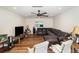 Bright living room with wood-look floors and neutral paint at 2825 Greenfield Ave, Orlando, FL 32808