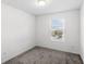 Simple bedroom with a window overlooking the street at 3092 Water Sprite St, Orlando, FL 32808