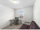 Bright bedroom featuring a workspace and a futon at 3092 Water Sprite St, Orlando, FL 32808