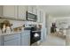 Spacious kitchen featuring stainless steel appliances and ample cabinet space at 3114 Partington Blvd, Davenport, FL 33837