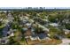 Aerial view showcasing a home with a backyard, neighborhood, and distant city skyline at 3118 Clemwood St, Orlando, FL 32803