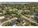 Aerial view of a house and surrounding neighborhood, showcasing the property's location and landscape at 3118 Clemwood St, Orlando, FL 32803