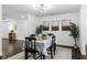 Elegant dining room with a charming floral tablecloth and stylish light fixture at 3118 Clemwood St, Orlando, FL 32803