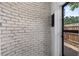 Unique curved brick wall detail in exterior nook with access to backyard at 3118 Clemwood St, Orlando, FL 32803