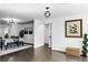 Bright hallway with dark hardwood floors and modern light fixtures at 3118 Clemwood St, Orlando, FL 32803