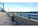 Lakeside walkway with benches offering scenic views and a peaceful atmosphere at 3118 Clemwood St, Orlando, FL 32803