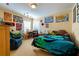 Cozy bedroom featuring colorful decorations and plenty of natural light at 3442 Starbird Dr, Ocoee, FL 34761