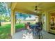 Covered patio with a view of the water, ideal for outdoor entertaining at 3442 Starbird Dr, Ocoee, FL 34761