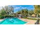 Inviting community pool with lush landscaping at 3442 Starbird Dr, Ocoee, FL 34761