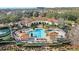 Aerial view of a community featuring tennis courts and pool at 417 Pavia Loop, Lake Mary, FL 32746