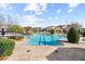 Resort-style pool with plenty of seating areas and lush landscaping, creating a relaxing atmosphere at 417 Pavia Loop, Lake Mary, FL 32746