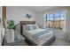 Bedroom with a full-size bed and coastal-themed bedding at 4233 Singing Mockingbird Blvd, Bartow, FL 33830