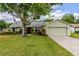 Charming home with a well-maintained lawn and landscaping at 4818 Breezy Palms Ct, Windermere, FL 34786