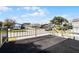 View from deck showing the community and parked cars at 50989 Highway 27 # 25, Davenport, FL 33897