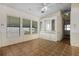 Dining room with built-in hutch and parquet flooring at 50989 Highway 27 # 25, Davenport, FL 33897