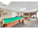 Community recreation room with two pool tables at 50989 Highway 27 # 25, Davenport, FL 33897