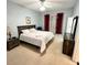 Bright bedroom featuring a king-size bed and ample closet space at 538 Bexley Dr, Davenport, FL 33897