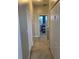 Upper hallway with access to bedrooms and closets at 538 Bexley Dr, Davenport, FL 33897