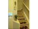 Indoor staircase with wall-mounted security panel at 538 Bexley Dr, Davenport, FL 33897