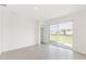 Living room with sliding glass doors leading to backyard at 738 Lemon Ave, Fruitland Park, FL 34731