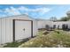 Spacious backyard with a shed, fire pit, and grassy area at 798 Saint Johns River Dr, Sanford, FL 32773