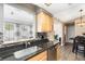 Modern kitchen with stainless steel sink and dishwasher at 798 Saint Johns River Dr, Sanford, FL 32773